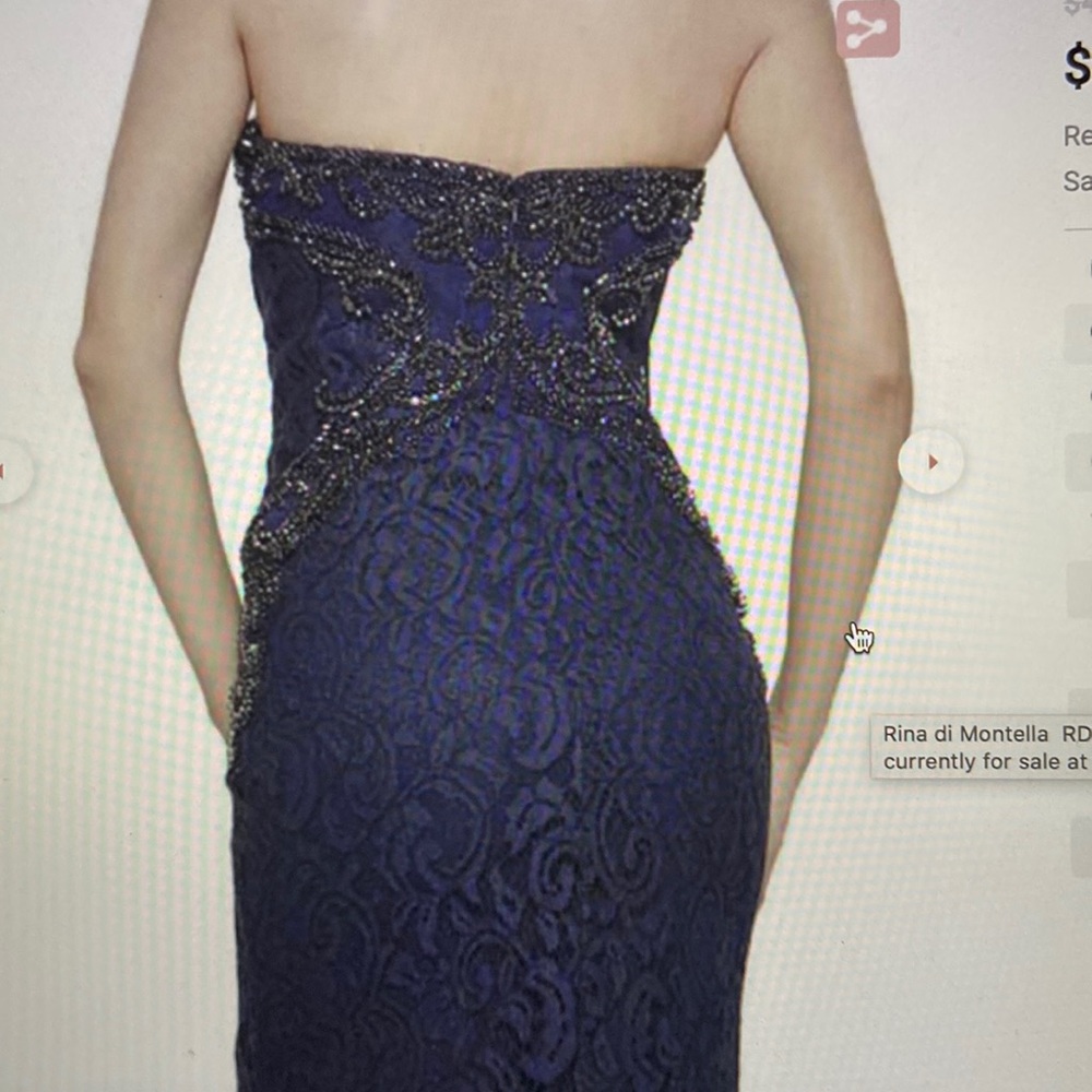 This a a beautiful dress. Never worn , bought off the rack